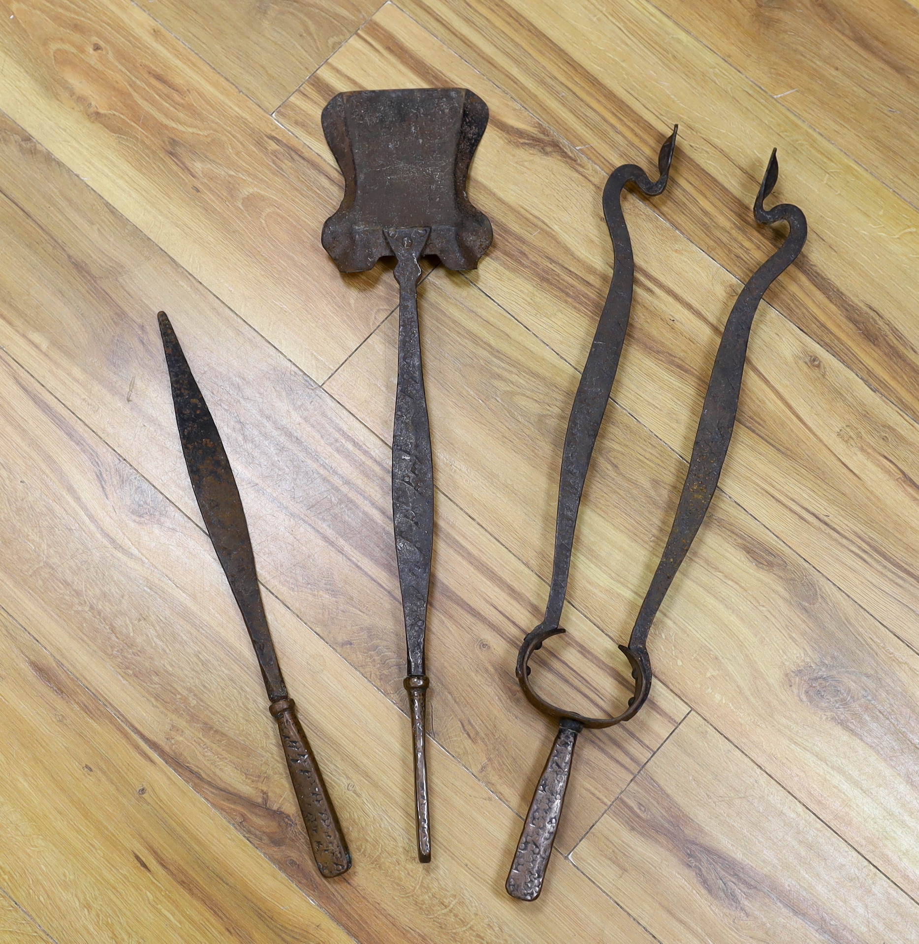 A set of Arts & Crafts fire irons